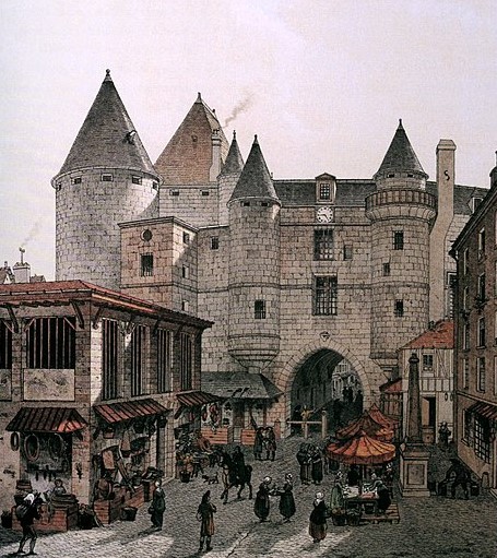 Medieval stone fortress with typical street scene in foreground