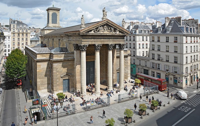 Neoclassical church building with metro station entrance