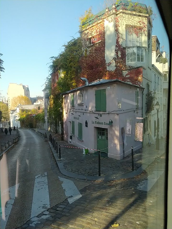 La Maison Rose, through a window