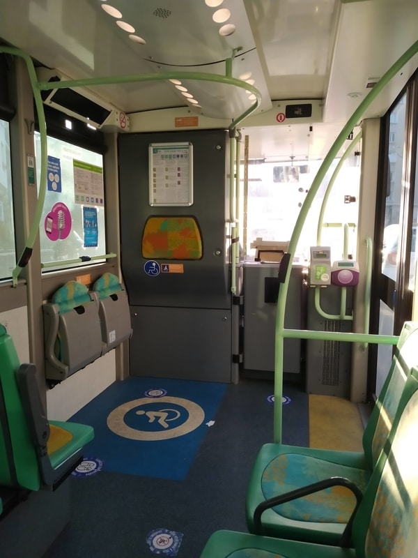 Minibus interior, with space for a wheelchair and standing room