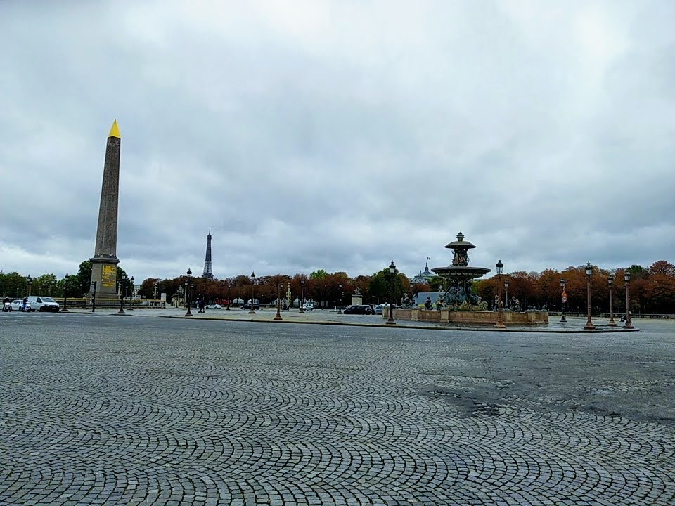 The Place de la Concorde, with fountain and obelisk, and Eiffel Tower in background