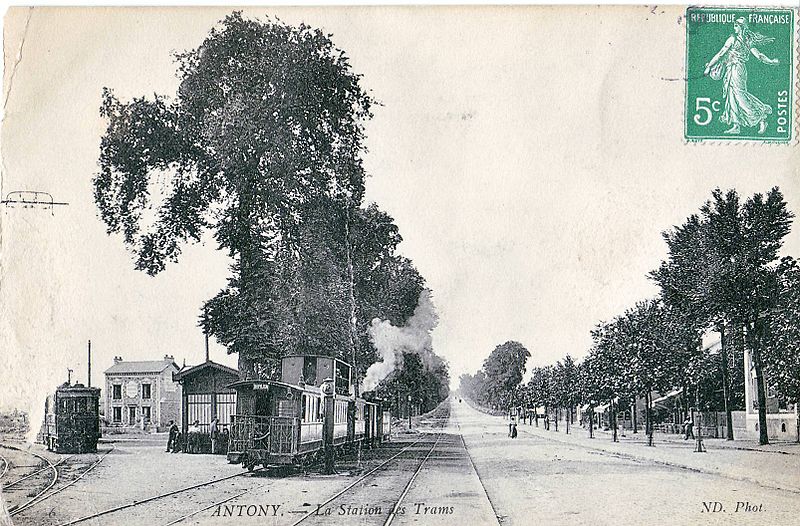 Postcard depicting tram stop and steam tram. Caption: Antony – La Station des Trams