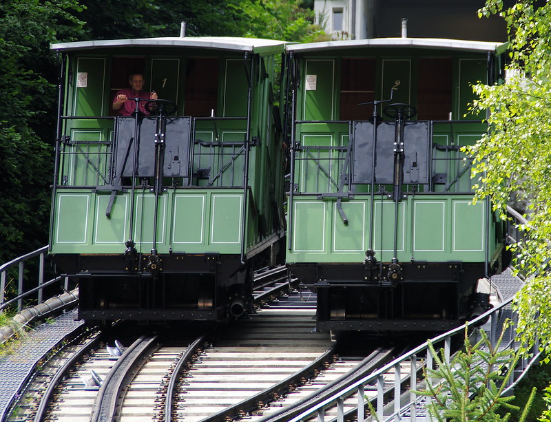 Two funicular cars at a passing loop